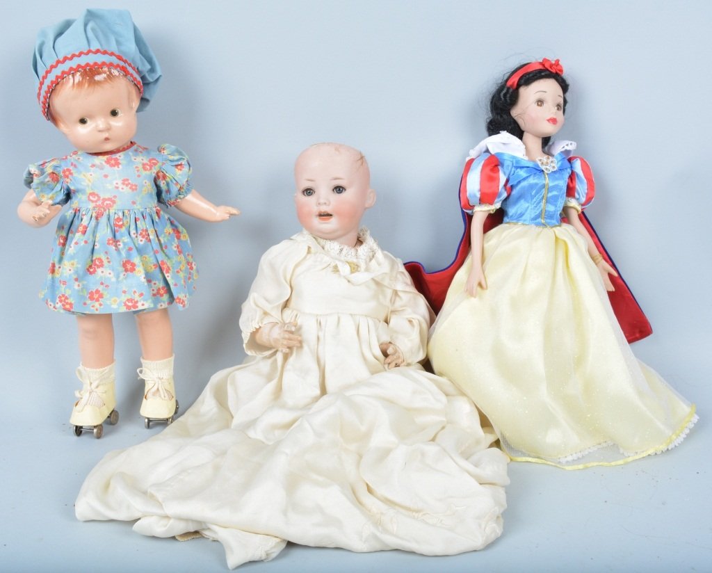 Lot of 3 Dolls: Lot includes 14" German bisque Otto Reinecke character baby, a 14" composition Effanbee Patsy Ann on roller skates, along with a contemporary 14'" Snow White doll. Very Good