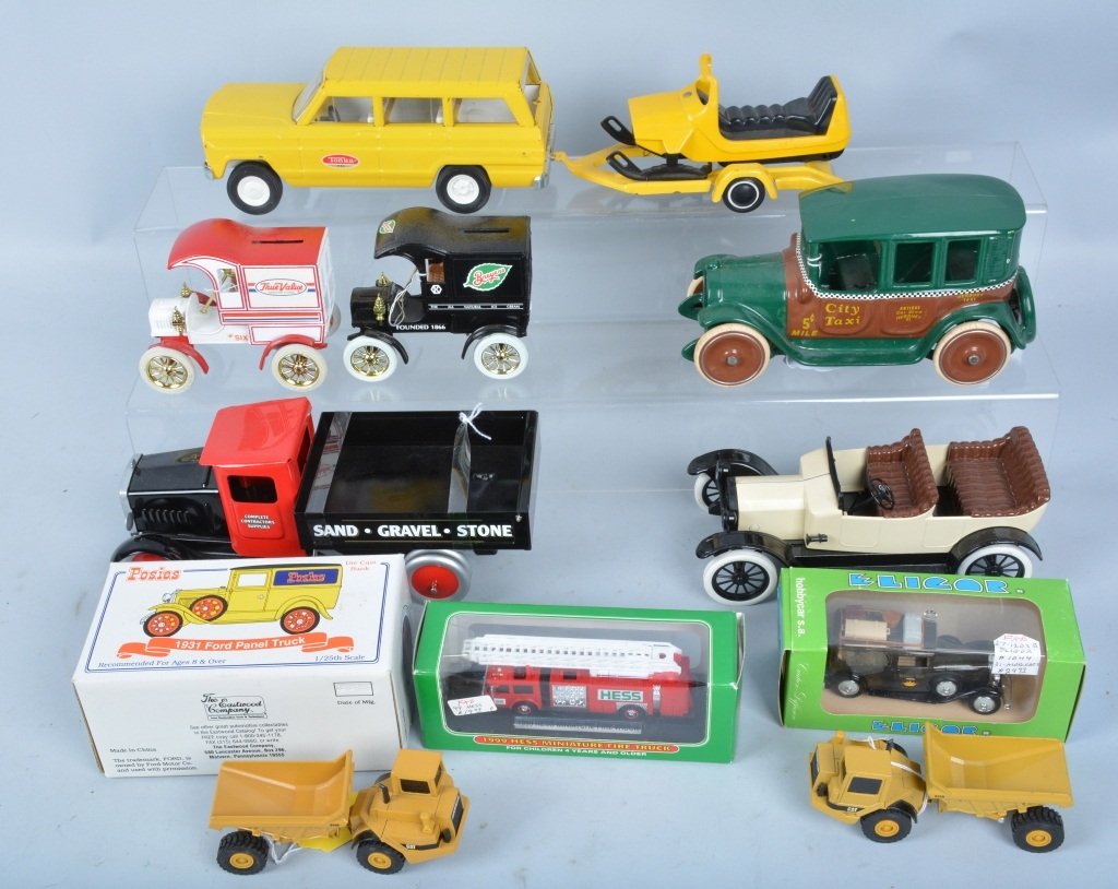 Lot of TOYS CARS & TRUCKS: Includes Tonka Jeep with Snowmobile, Modern Metalcraft Sand Truck, Modern Arcade Taxi, and more diecast cars. Some boxes. Excellent