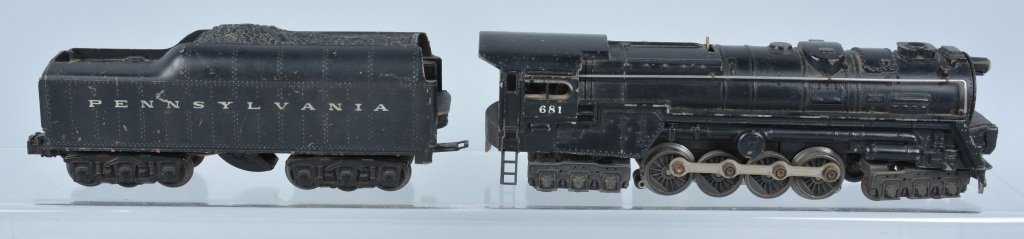 LIONEL #681 ENGINE & 2671W TENDER: Nice all original engine and tender set. Some minor wear throughout. Step on tender is broke but piece is present for easy fix. Very Good