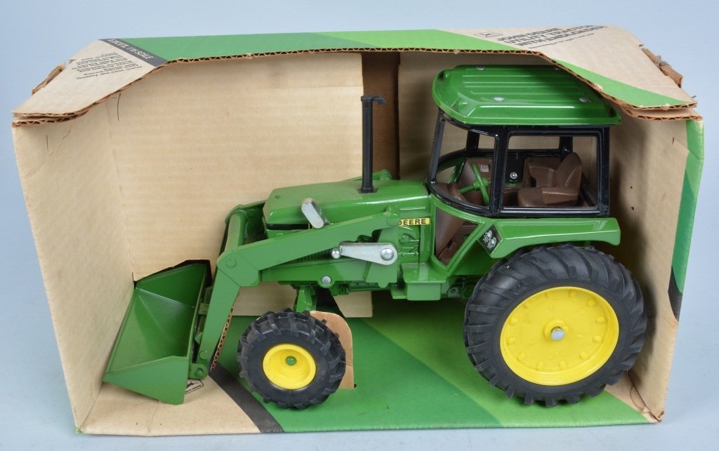 ERTL John Deere Utility Tractor with End Loader: Vintage ERTL John Deere Utility tractor with end loader in box, 1/16 scale, Near Mint