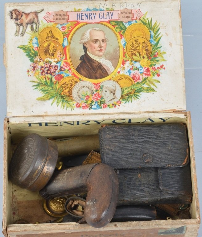 Lot of Military Items & More in Wood Cigar Box: Varied grouping with many military buttons, a a glass vial medical kit, shooters medals, Deputy Marshall badge, shako Infantry buttons, and much more. Good-Very Good