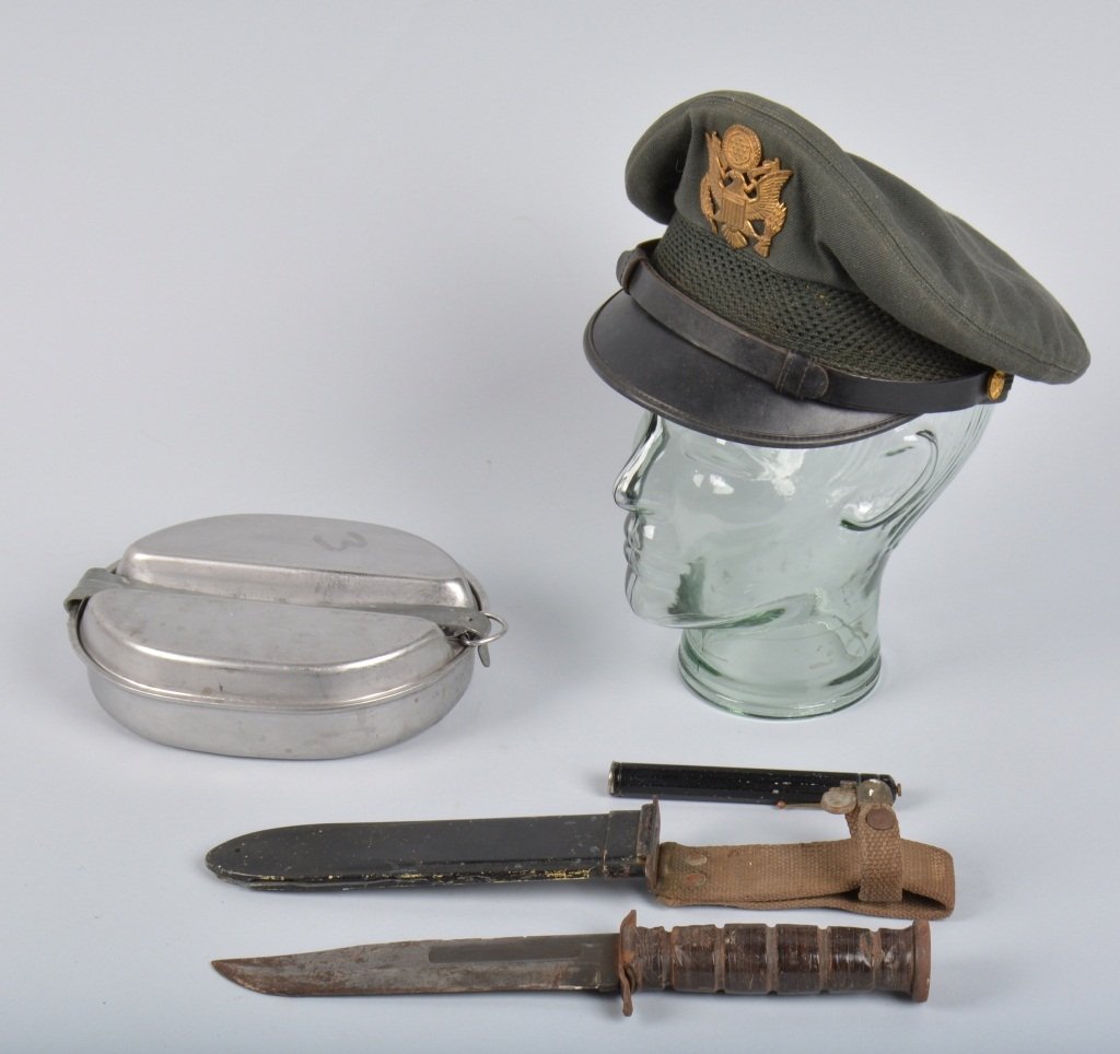 Lot US Military Items, Ka-Bar, Mess Kit & More: Lot includes USN MK2 Ka-Bar with sheath, 1945 EA Co. mess kit, military pen light, and US Army hat. Knife shows wear and should clean to a higher grade, Scabbard is cracked, Very Good