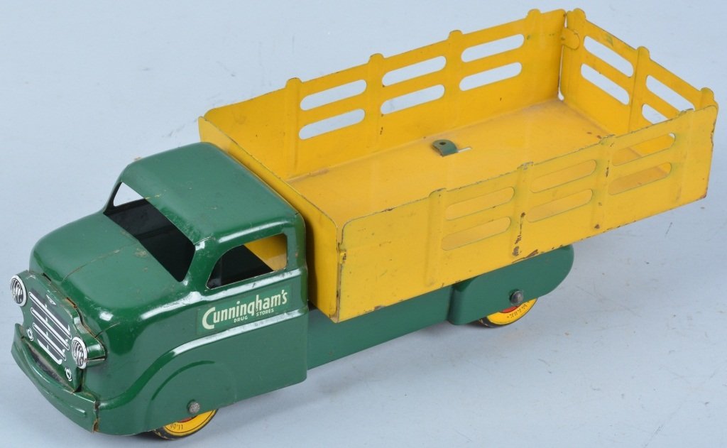 MARX Pressed Steel CUNNINGHAM'S STAKE TRUCK: Nice Marx pressed steel Stake Truck with Cunningham's Drug Stores decals. Unusual private label truck. Great colors. 13" Excellent