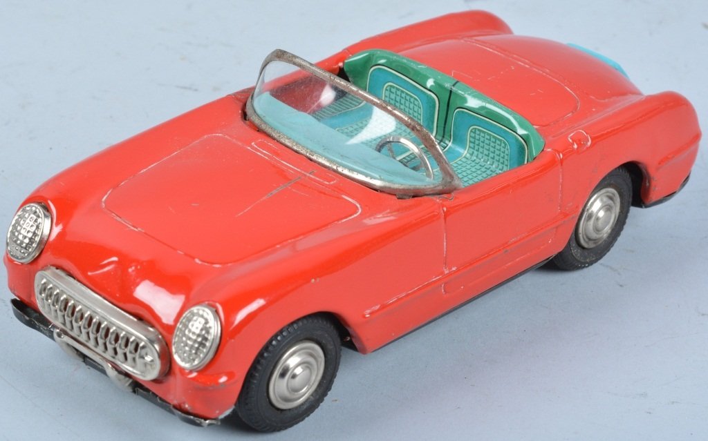 BANDAI Tin Friction CORVETTE: Excellent tin friction Corvette by Bandai of Japan. All original with nice colors and details. Friction works. 7" Excellent