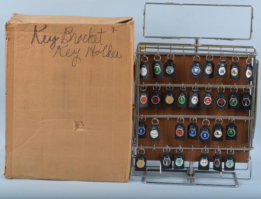 Automotive Key Fob Rack, Boxed, Vintage: Measures about 21" by 17" and includes several leather and metal key fobs. Also includes the original shipping box. Very Good