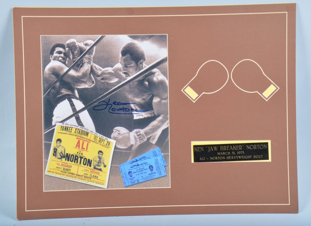 Ken Norton Autographed Boxing Photo: Measures 24" by 18" with the matting. Suitable for framing. Excellent