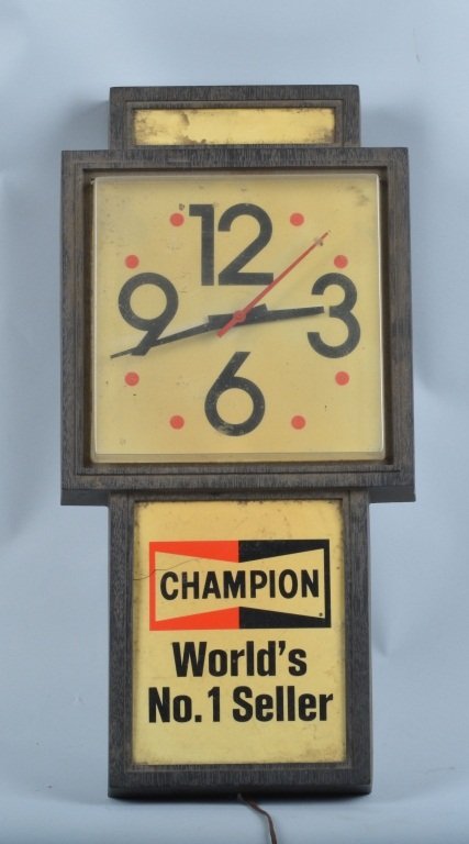 Champion Spark Plug Advertising Clock: Measures about 24". Lights up and works. Has a crack in bottom plastic face. Very Good