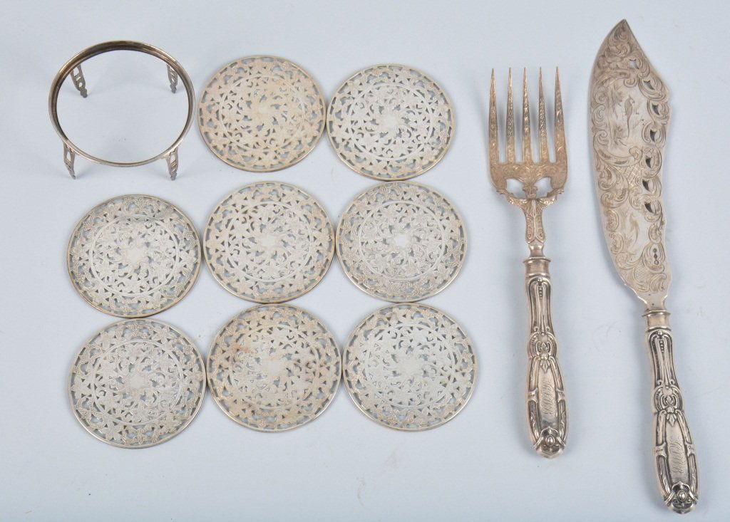 Lot of Sterling Silver Coaster Set & More: Lot includes 8 sterling silver coasters on a base, along with a silver serving set. The serving set is etched and nicely detailed. Excellent