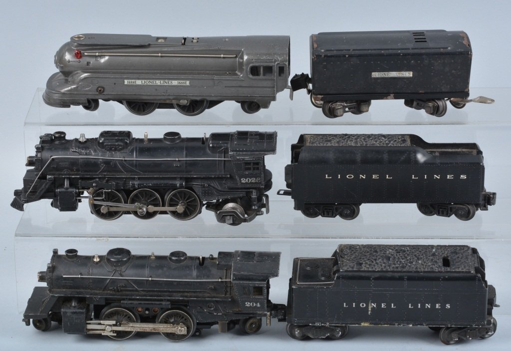 Lot of Lionel Engines & Tenders: Lot includes Locomotive Nos. 2026, 204, and 1688E. Tenders are 2689W, 6466WXm and the last one is unmarked. Very Good