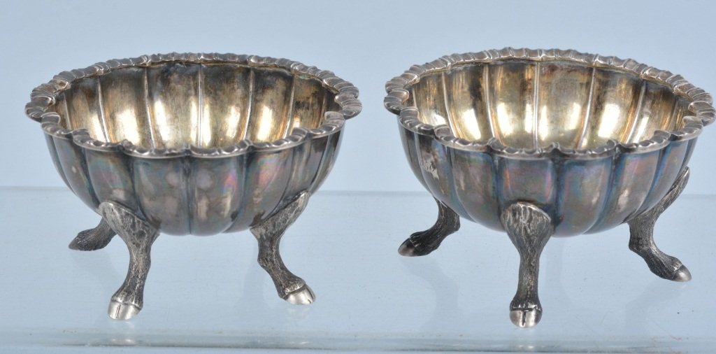 L0t of 2 Boston Coin Silver Bowls, Dated 1856: Nice matching pair of 2 small footed bowls. Each measures about 3" diameter. Very nice detail and stag hoof feet. Excellent