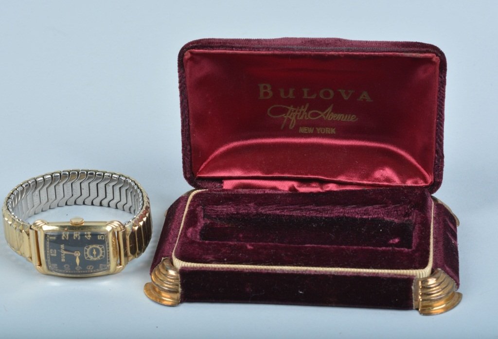 14K Gold Bulova Wrist Watch In Box: Very nice working 14k gold watch in the original box. Excellent