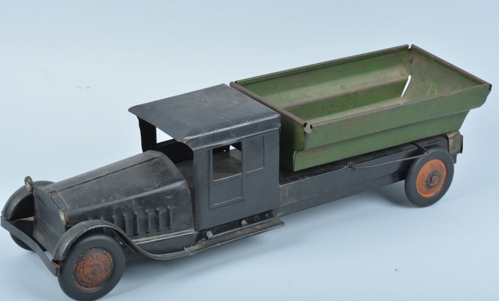 Cor Cor 1920's Pressed Steel Dump Truck: Measures about 24" long, and is all original. Paint should clean to a higher grade. Very Good
