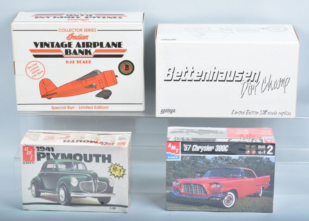 AIRPLANE BANK, MODEL KIT, & GMP DIRT RACER: Indian Motorcycle Airplane Bank, GMP Bettenhausen Dirt Champ Car, and 2 AMT Model Kits. All Boxed. Excellent