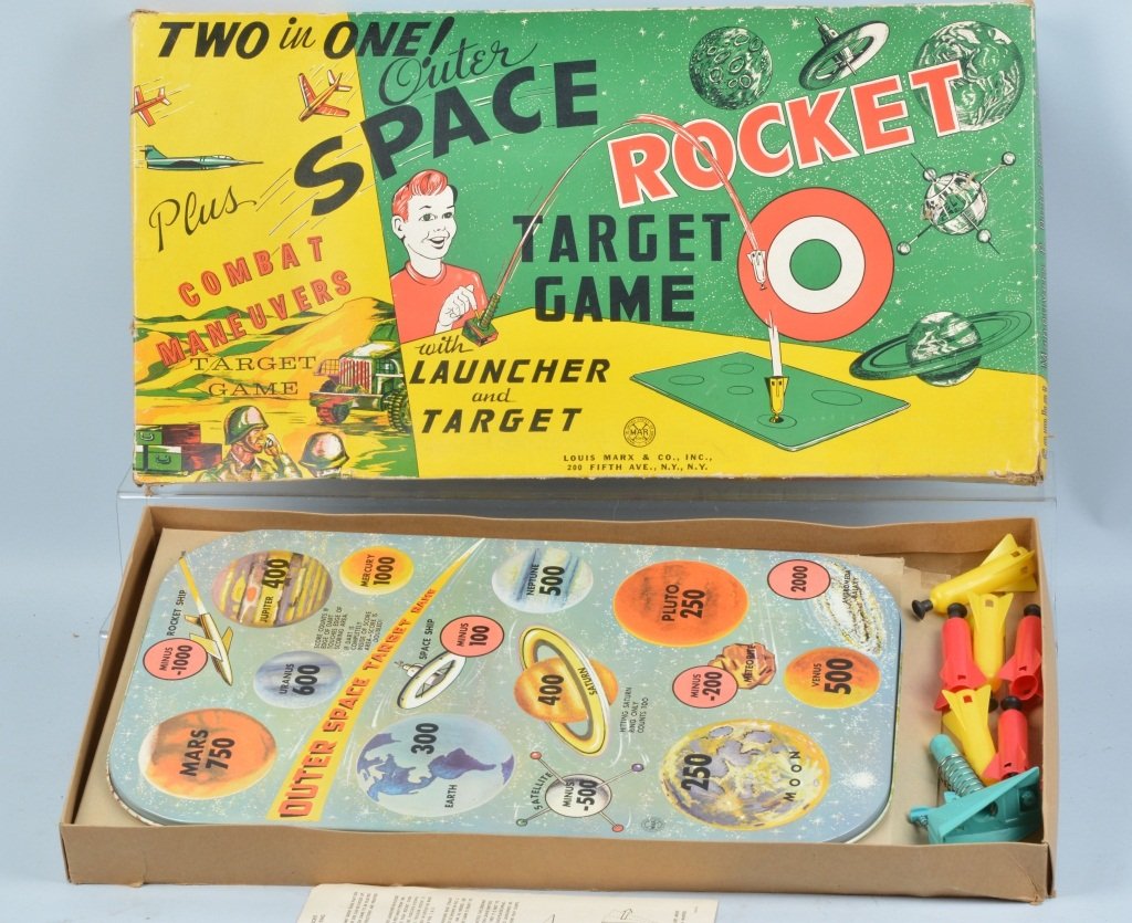 MARX OUTER SPACE ROCKET TARGET GAME w/ BOX: Excellent Marx target game. Has tin target with great outer space graphics. Looks complete with launchers and bombs. With box. 27"x14" Excellent