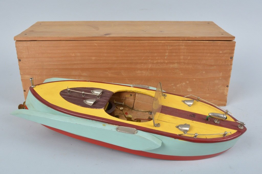 JAPAN Battery Op WOODEN FUTURISTIC BOAT w/ BOX: Excellent battery op Wooden Boat with excellent Futuristic Design made in Japan. All original with great paint and colors. Excellent details and design. Has inboard motor. Comes with spare motor and o