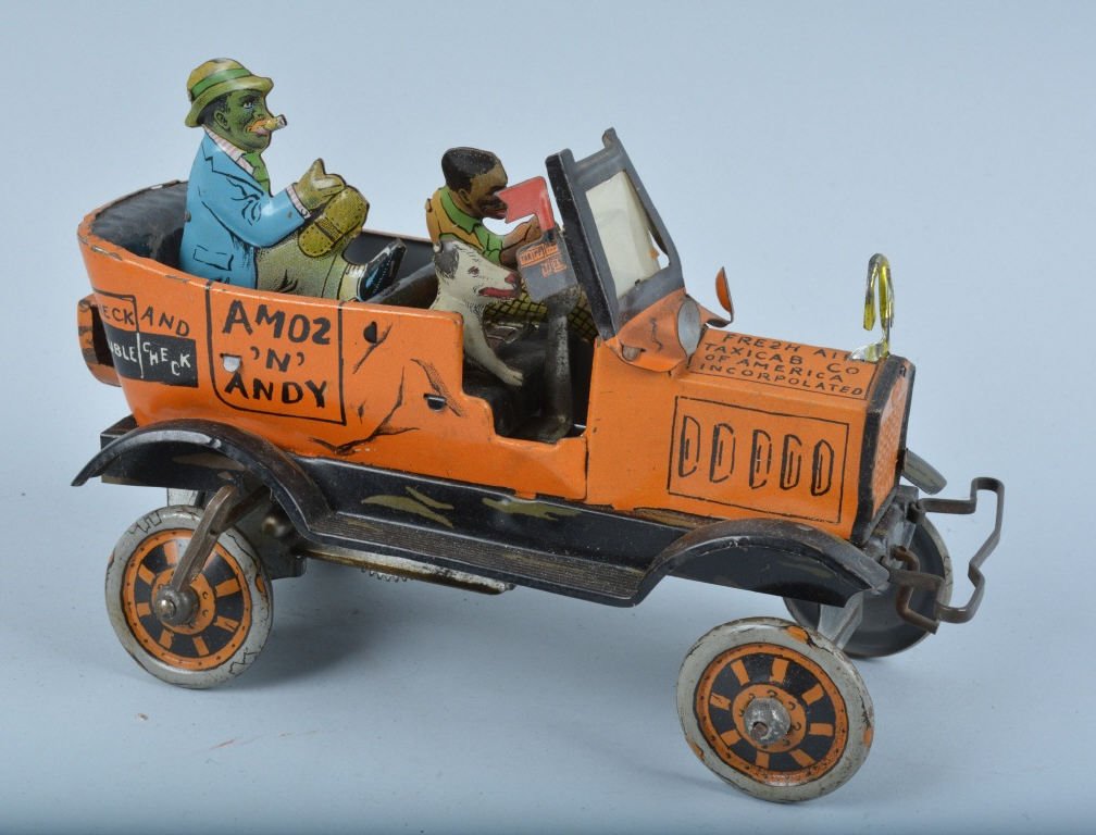 MARX Tin Windup AMOS & ANDY FRESH AIR TAXI: Beautiful all original Marx tin windup Amos & Andy fresh Air Taxi. Toy is all complete with horse shoe, crank, dog, and figures. Very nice colors and details. Windup works. 8" Excellent
