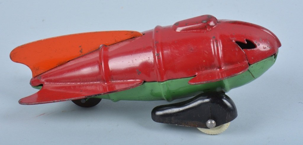 WYANDOTTE Pressed Steel ROCKET SHIP: Nice all original Wyandotte pressed steel Rocket Ship. Very nice paint and complete. 6" Excellent