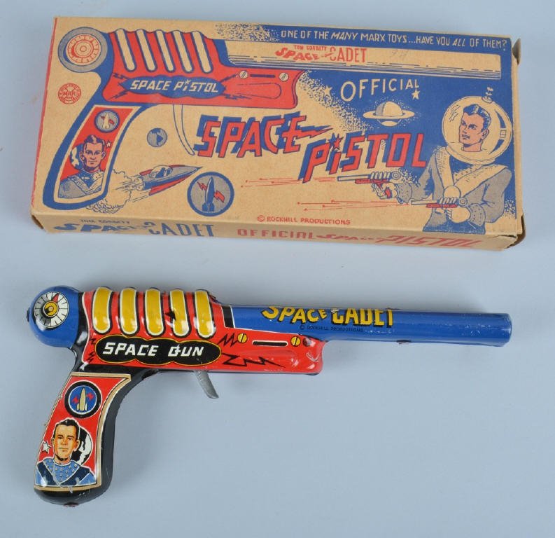 MARX Tin TOM CORBETT SPACE CADET PISTOL w/BOX: Excellent Marx tin clicker Tom Corbett Space Cadet Pistol. Great looking all original toy pistol. Has beautiful colors and graphics. Clicker action works. Looks virtually unplayed with condition. Come