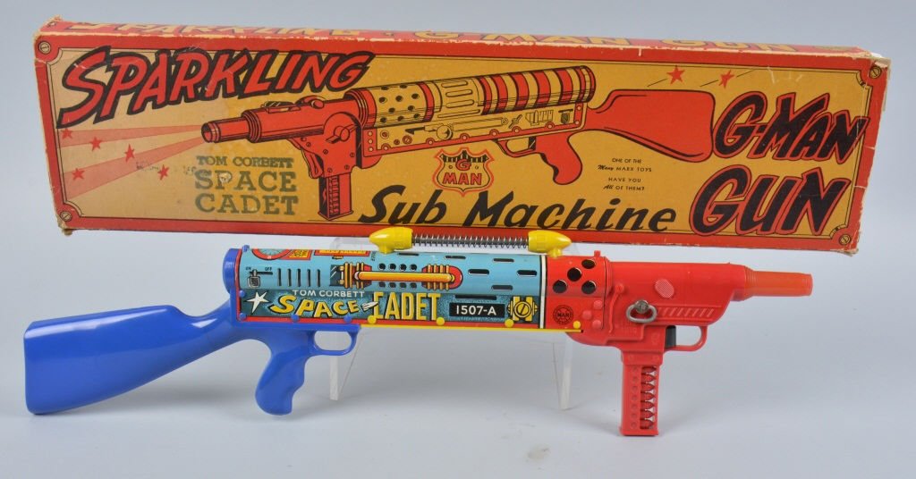 MARX Tin Windup TOM CORBETT SPACE RIFLE w/ BOX: Excellent Marx tin and plastic windup Tom Corbett Space Cadet Space Rifle. Excellent looking Marx Space Rifle. Toy is all original and complete. It has great colors. Windup clicker action still works.