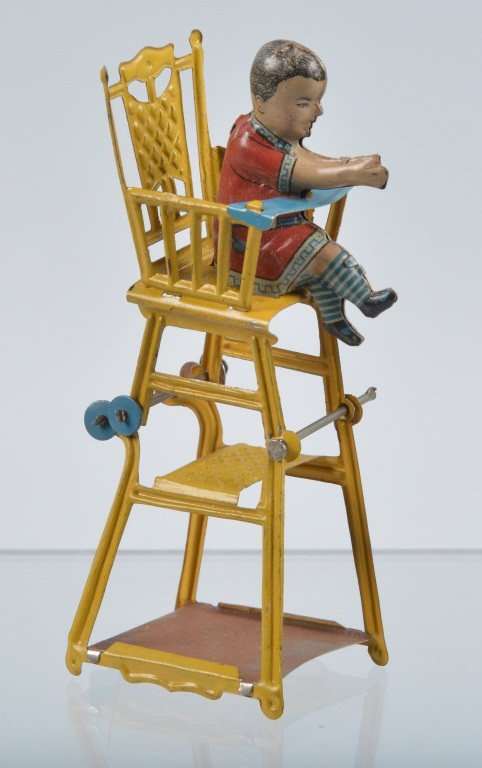 GERMAN PENNY TOY BABY IN HIGH CHAIR (1 of 4)