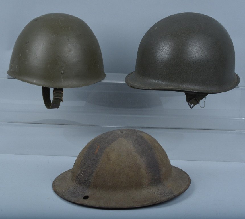 LOT OF 3 HELMETS, US M1, DOUGHBOY & MORE: Nice lot with WW1 Doughboy helmet with liner, has hole in rim, M1 rear seam, swivel bale helmet with liner, and another helmet with liner. Conditions Good-Excellent