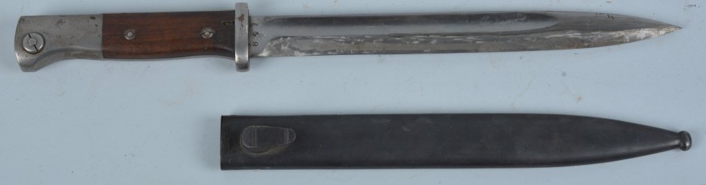 WWII GERMAN MAUSER K98 BAYONET w/ SHEATH: Nice WWII German Mauser K98 Bayonet #841 with sheath #730. Knife is in good shape with signs of sharpening. Has wood handle that is original to the knife. Sheath is in nice original condition. 16" ove
