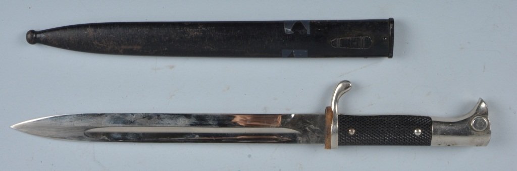 WWII NAZI POLICE DRESS EICKHORN BAYONET & SHEATH: Nice WWII Nazi Police Dress Bayonet with Sheath. Bayonet is marked Eickhorn with the squirrel on blade. Blade is in beautiful condition. Has original grips. Comes with original sheath with slight wear