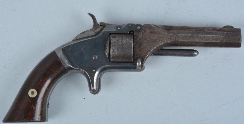 SMITH & WESSON M1, .22 SECOND ISSUE REVOLVER: #90790, 3 1/4" barrel with very good bore. has 50% original blue finish, operates perfectly, nice markings, perfect rosewood grips. Very Good-Excellent