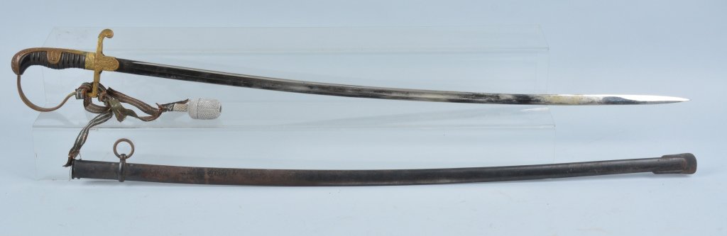 WWII GERMAN NAZI OFFICER'S SWORD: German officer's sword, 32 3/4" mirror finish single fullered blade, original washer, perfect ebony grip with spiral wire, finely cast hilt with traces of gold wash. Nazi army eagle on langette. Scabb