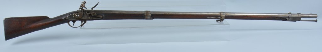 M1795 US SPRINGIELD FLINTLOCK MUSKET, 1808: 44 1/2 .69 caliber barrel, with proof mark at breach. Vivid markings on lock dated 1808, very good stock with light US cartouche on left flat. Butt plate dated 1812, retains both bell shaped sling swi