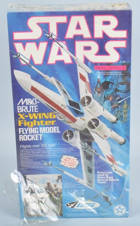 ESTES STAR WARS X-WING FIGHTER MODEL ROCKET MIB: Estes Star Wars X-Wing Fighter Model Rocket. Mint sealed in original box. Cello has some rips. Builds 22" Rocket. Excellent