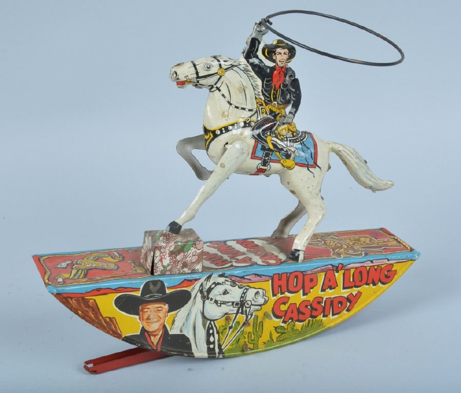 MARX Tin Windup HOP A LONG CASSIDY ROCKER: Marx tin windup Hop A Long Cassidy Rocker. All original including arm. Has great colors and details. Windup works. 11" Excellent