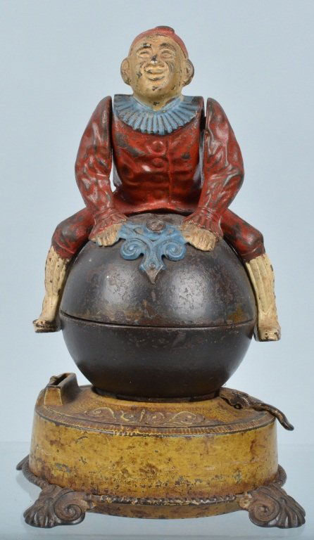 JE STEVENS CLOWN ON GLOBE MECHANICAL BANK (1 of 7)