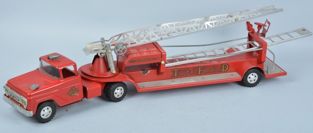 TONKA Pressed Steel HYDRAULIC LADDER FIRE TRUCK: Tonka pressed steel #5 Hydraulic Ladder Fire Truck. All original with nice paint and decals. Has dent in hood. 32" Excellent