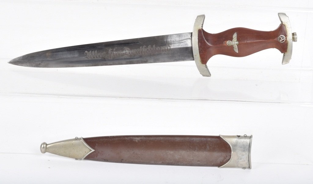 NAZI GERMAN SA DAGGER KARL ROB. KALDENBACH: Nicely marked Karl Rob. Kaldenbach, Solingen -GR, original condition, some hairlines and chipping to wood grip, blade is bright, and shows evidence of cleaning, Scabbard has original finish and nickel