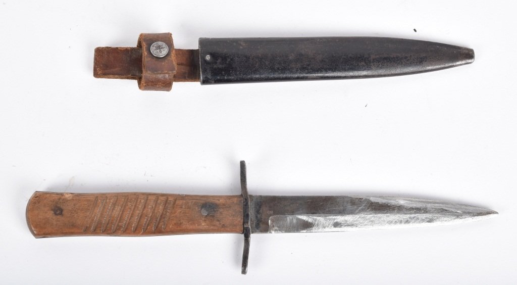 GERMAN WW2 DeMAG COMBAT BOOT KNIFE & SCABBARD: 5 1/2" blade shows wear and sharpening. Light markings. Very good wood handle, scabbard is very good with original leather frog. Very Good