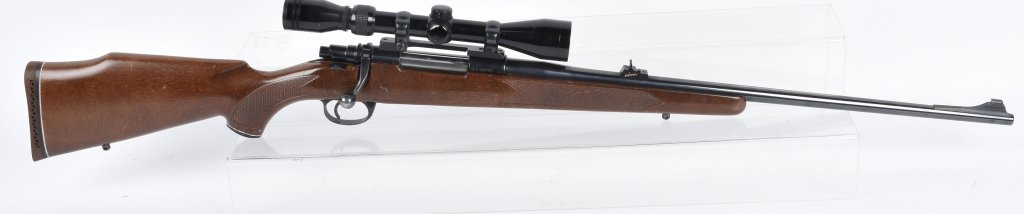 INTERARMS, MARK X, .7MM RIFLE with SCOPE: SN D304700, 90% original finish, nice bore, crisp action, Golden Antler scope, some nicks and scratches to stock. A very nice rifle. Excellent *
