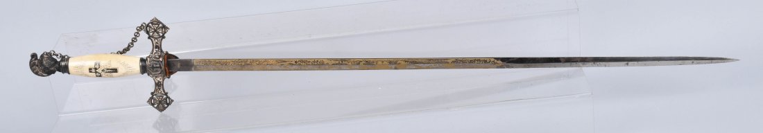 19th CENTURY KNIGHTS TEMPLAR ENGRAVED & NAMED: 29 1/2" high grade sword, with engraved blade, elaborate Knights head pommel, and guard, bone engraved handle, Made by MC Lilley. No scabbard, Excellent
