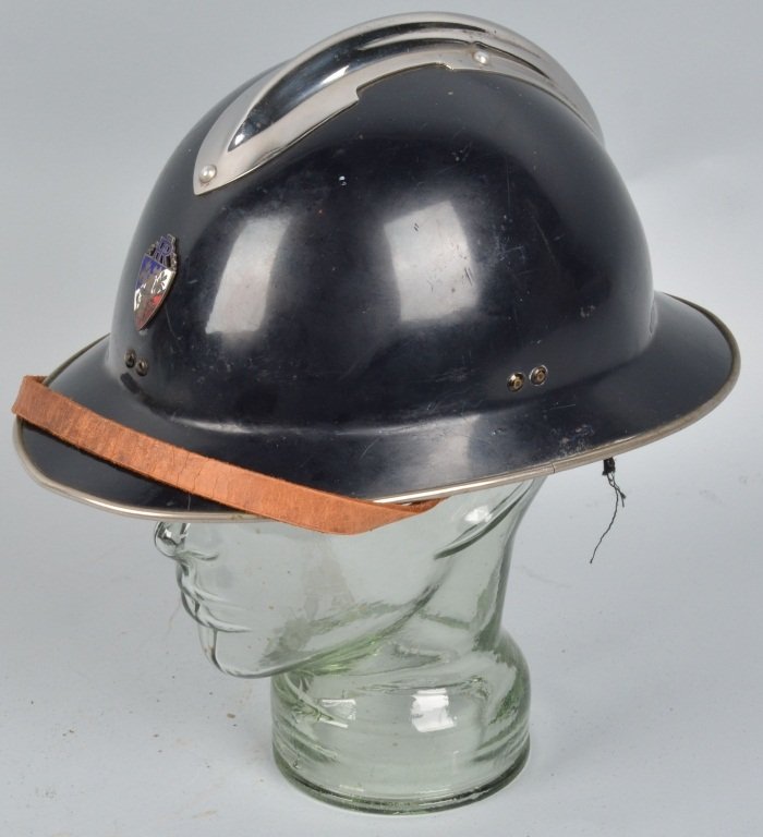 FRENCH STEEL ADRIAN POLICE HELMET: Minor wear, nice enameled insignia, full liner and chin strap. Excellent
