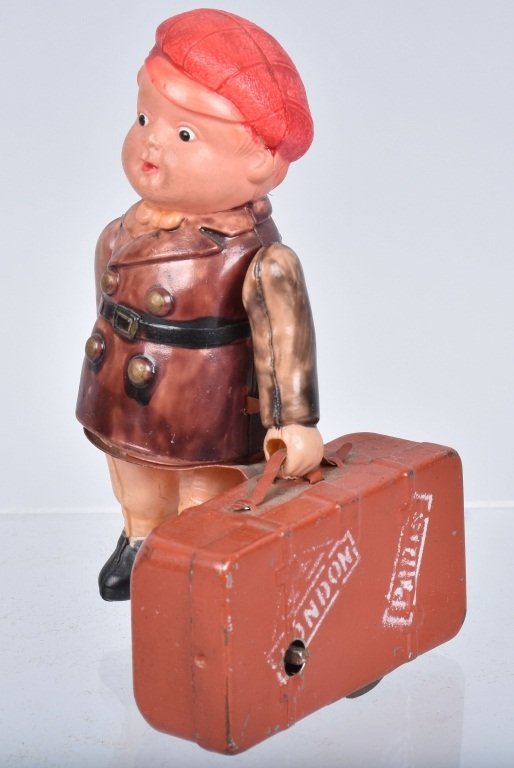 JAPAN Celluloid Windup BOY WITH SUITCASE (1 of 4)