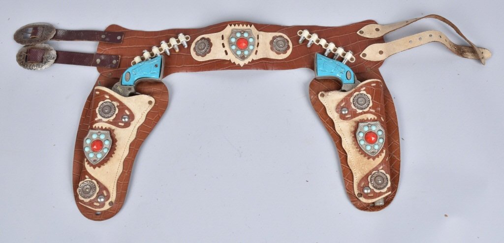 HUBLEY US MARSHALL TURQUOISE CAP GUNS w/ HOLSTER: Nice set of Hubley Cap Guns in very ornate holster. Has some wear. Very Good