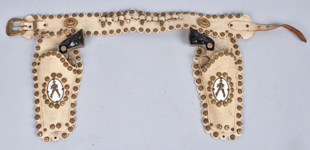 2- GOLD PLATED TEXAN CAP GUNS w/ HOLSTER: Leather holster with 2 nice gold platedc cap guns. Excellent