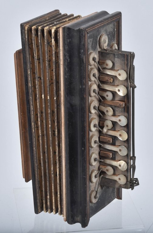 ANTIQUE CONCERNTINA ACCORDIAN: Measures 12" by 5" closed, nicely made with mother of pearl keys and inlayed wood trim, bellows look good, missing frame end piece. Should clean to a higher grade. Good-Very Good