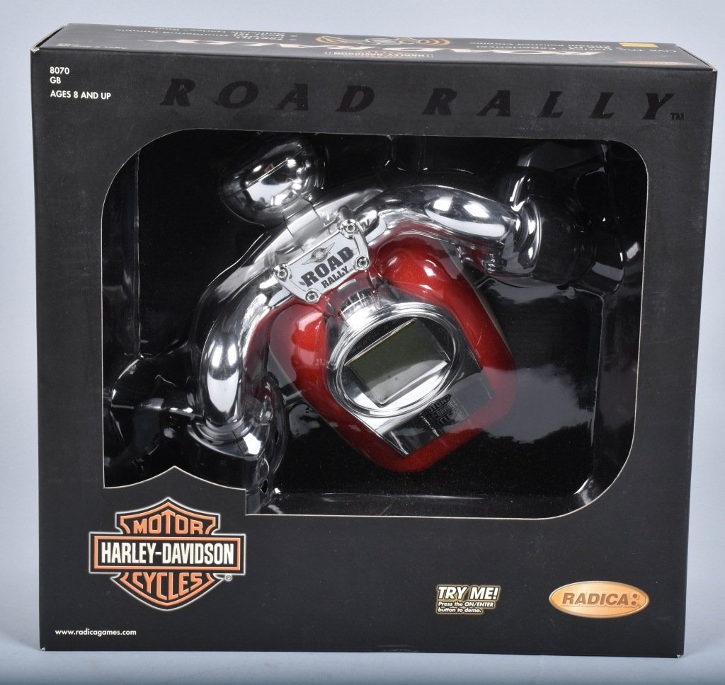 HARLEY DAVIDSON ROAD RALLY ELECTRONIC GAME MIB: Excellent Harley Davidson electronic game. Look alike tank and handle bars off a Harley. You pick the bike and have virtual experience of riding. Never used sealed in box. Near Mint