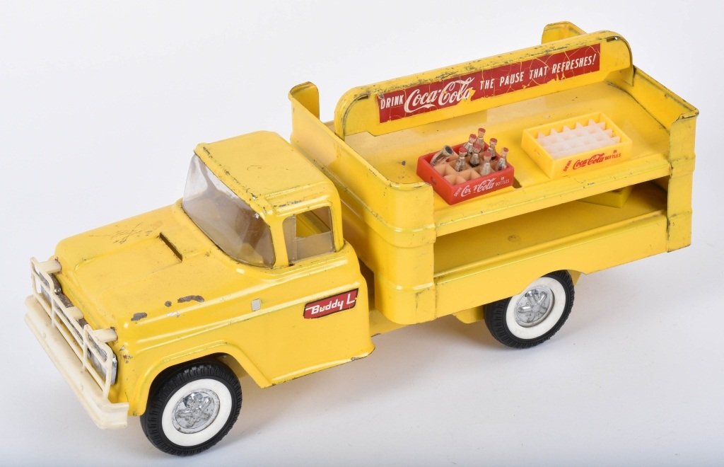 BUDDY L COCA COLA TRUCK: Nice original Coca Cola Truck. Has light wear and missing mirror. Comes with accessory oke cases. 15" Very Good