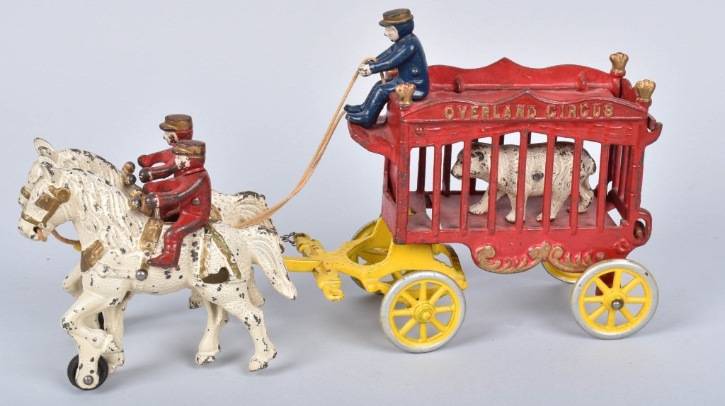 HUBLEY Cast Iron OVERLAND CIRCUS POLAR BEAR WAGON: Nice all original Overland Circus Polar Bear Wagon. Nice paint. Has all 3 riders and polar bear. No breaks. 14" Excellent