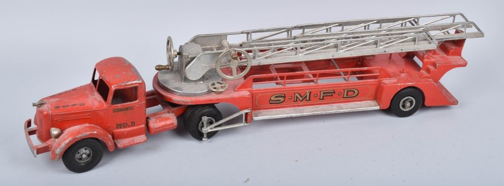 SMITH MILLER SMFD LADDER FIRE TRUCK: Nice all original truck. Has some wear. Bumper broke on one side. 36" Very Good