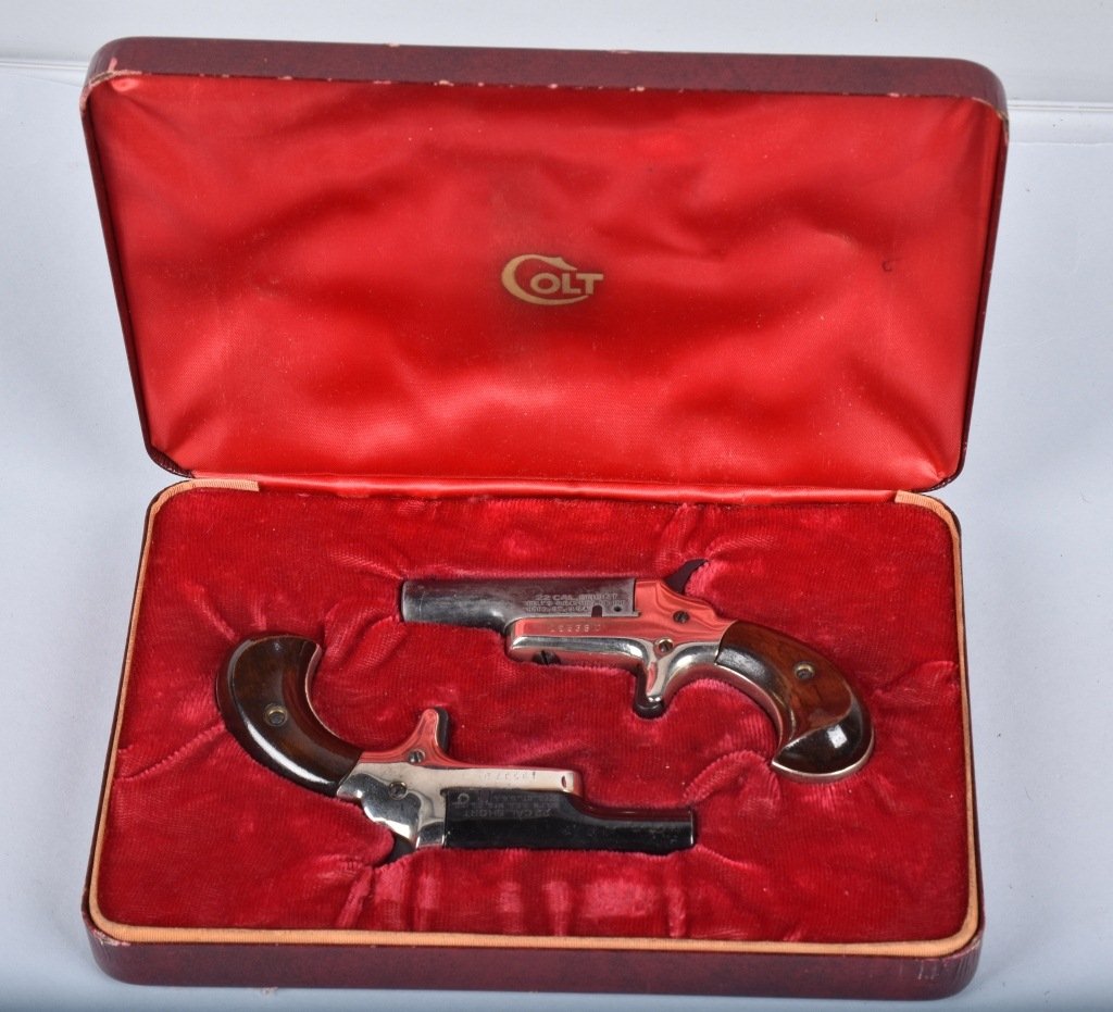 COLT CASED SET .22 DERRINGERS: SN 19536D and 19537D, 2 3/8" barrels with excellent bores, one appears unfired, and the other has been fired. One is Very Good plus, the other is Excellent