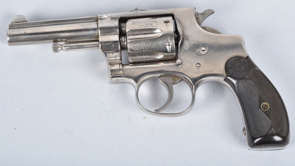 SMITH & WESSON, H.E. 1ST MODEL, DA . 32 REVOLVER: SN 8948, Back strap engraved "NEWARK POLICE NO. 165", 3 1/4" barrel with very good bore, has been re nickeled at one time, tight action, nice hard rubber grips. Very Good-Excellent *