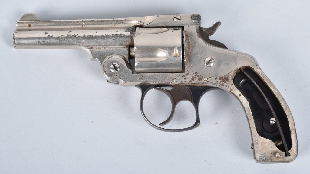 SMITH & WESSON.32 REVOLVER, AMERICAN EXPRESS: SN *454390, back strap engraved Am. Ex. Co. 1499, 1/4" barrel with very good bore, old re-nickel, retains about 90% finish, missing one hard rubber grip. Action tight,. Very Good *
